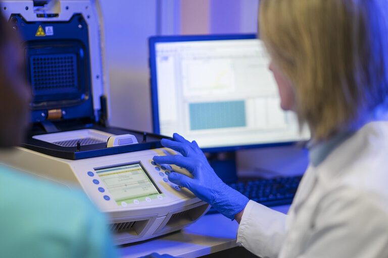 doctor performing medical research lab